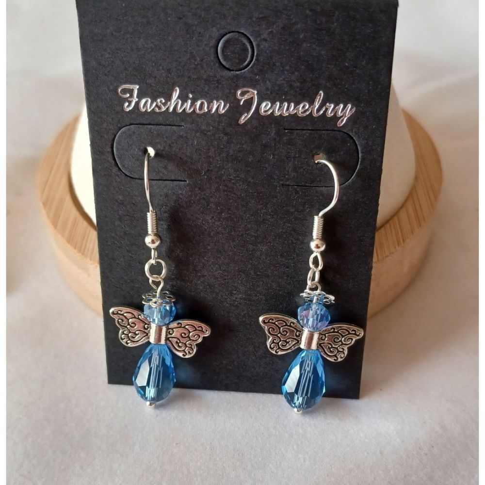 NWOT angel earrings light blue